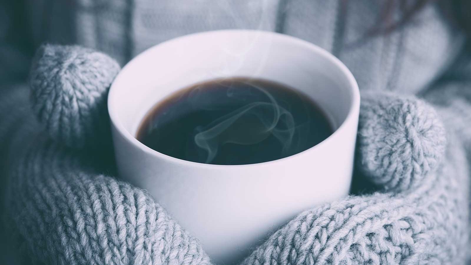 Holding a mug of warm liquid in winter
